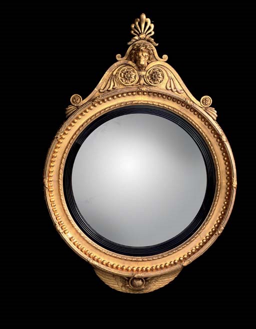 A REGENCY GILTWOOD LARGE CIRCULAR CONVEX MIRROR