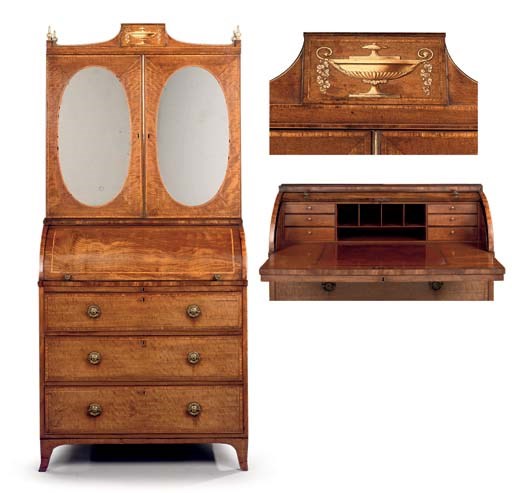 A GEORGE III MAHOGANY AND FIDDLEBACK MAHOGANY CYLINDER BUREAU-CABINET