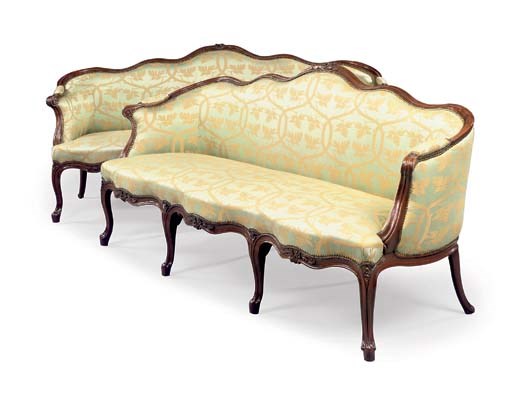 A PAIR OF GEORGE III MAHOGANY SOFAS