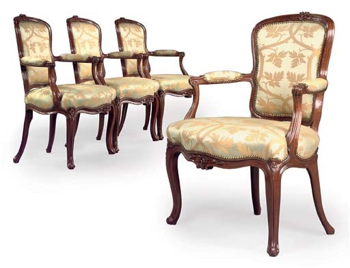 A SET OF FOUR GEORGE III MAHOGANY ARMCHAIRS