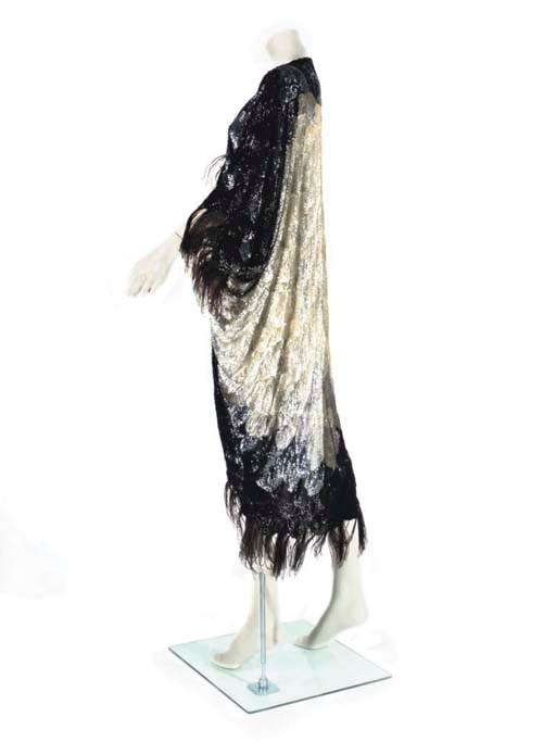 AN EMBELLISHED EVENING WRAP, POSSIBLY POIRET