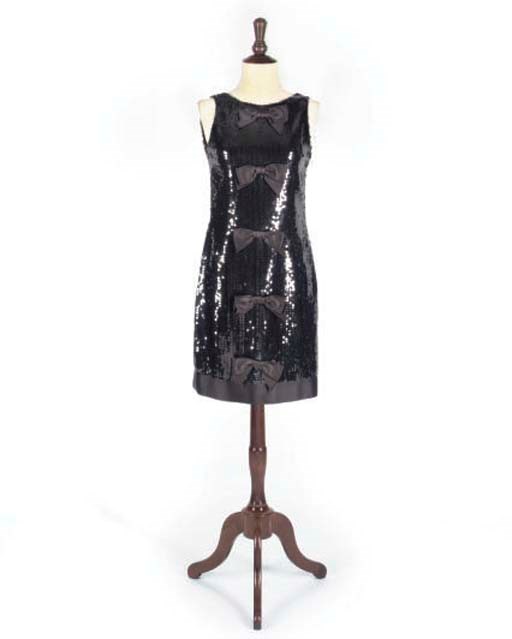 CHANEL BOUTIQUE, A LITTLE BLACK DRESS AND A SUIT