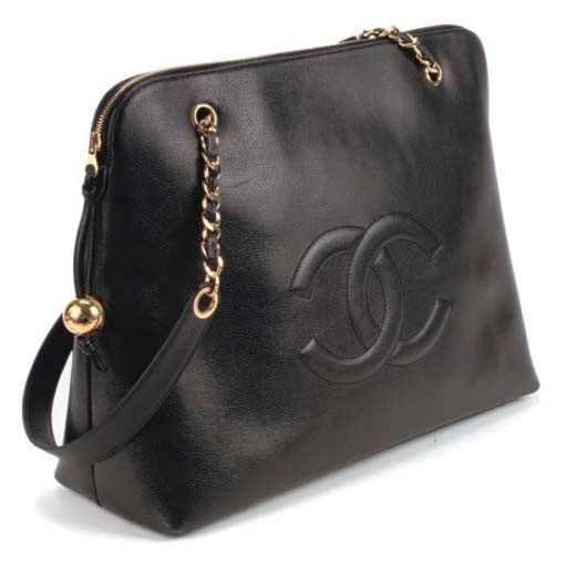 AN OUTSIZED BLACK LEATHER HANDBAG, CHANEL