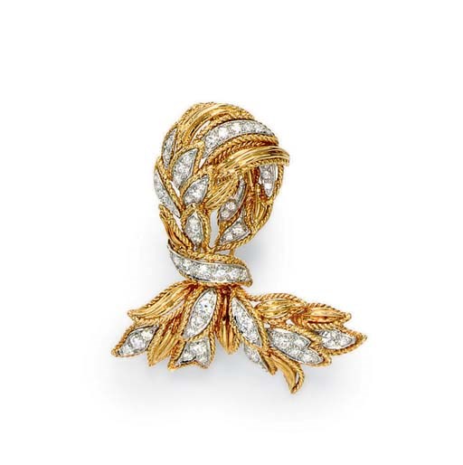 A DIAMOND AND GOLD BROOCH, BY VAN CLEEF & ARPELS