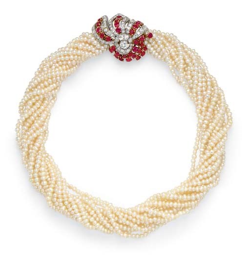 A SEED PEARL, DIAMOND AND RUBY TORSADE, BY CARTIER