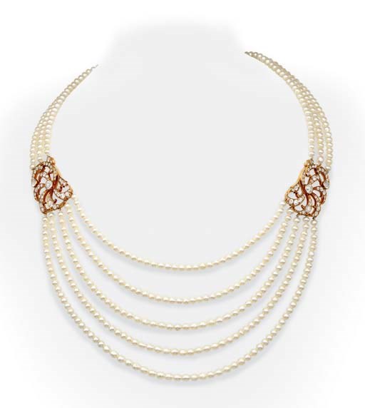 A MULTI-STRAND PEARL NECKLACE