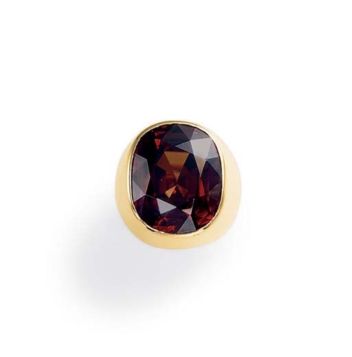 A BROWN ZIRCON AND GOLD RING, BY CARTIER