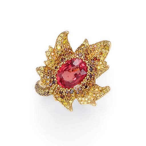 A COLORED SAPPHIRE, COLORED DIAMOND AND GOLD RING