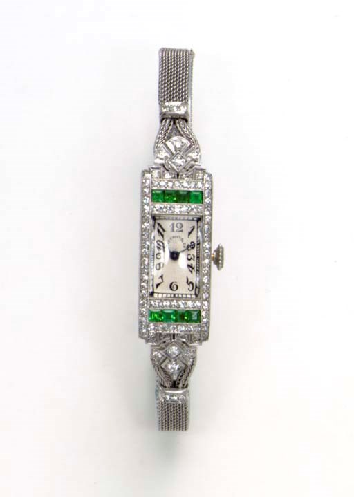 AN ART DECO EMERALD AND DIAMOND WRISTWATCH, BY TIFFANY & CO.
