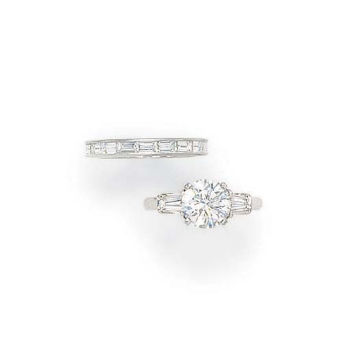 A DIAMOND RING AND BAND, BY CARTIER