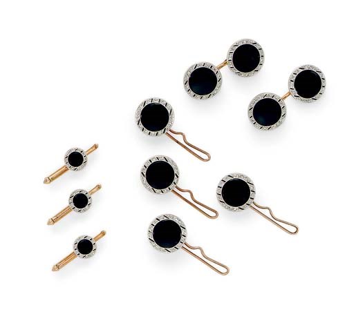 AN ART DECO ONYX AND DIAMOND DRESS-SET, BY J.E. CALDWELL & CO.