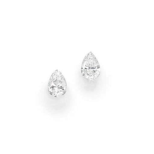 A PAIR OF UNMOUNTED PEAR-SHAPED DIAMONDS