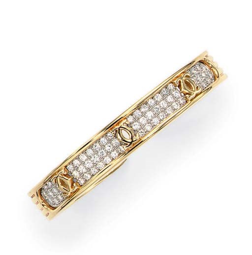 A DIAMOND AND GOLD BRACELET, BY CARTIER