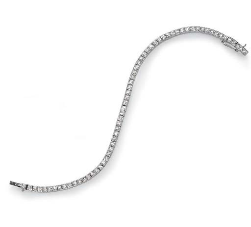 AN ART DECO DIAMOND LINE BRACELET, BY CARTIER