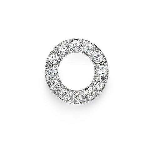 AN ART DECO DIAMOND CIRCLE BROOCH, BY J.E. CALDWELL & CO.