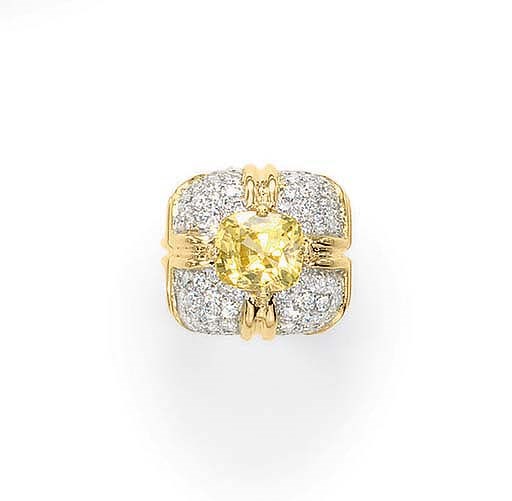 A YELLOW SAPPHIRE AND DIAMOND RING