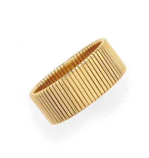 A GOLD "TUBOGAS" BANGLE BRACELET, BY BULGARI