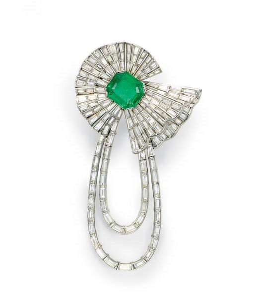 AN EMERALD AND DIAMOND BROOCH
