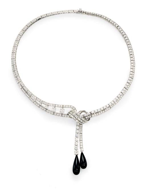 A DIAMOND AND ONYX NECKLACE