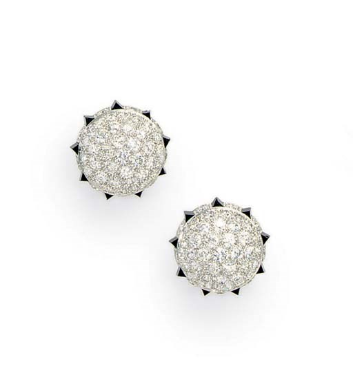 A PAIR OF DIAMOND AND ONYX EAR CLIPS