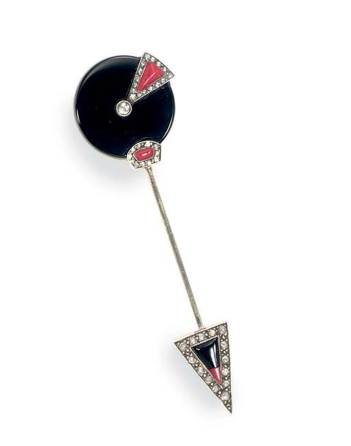 **AN ART DECO, ONYX, CORAL AND DIAMOND JABOT PIN, BY FOUQUET