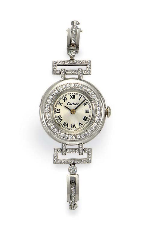 AN ART DECO DIAMOND AND PLATINUM WRISTWATCH, BY CARTIER