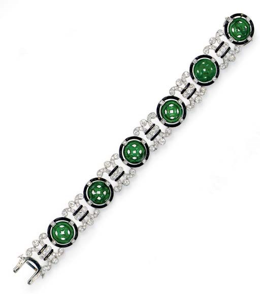 AN ART DECO JADEITE, DIAMOND AND ENAMEL BRACELET