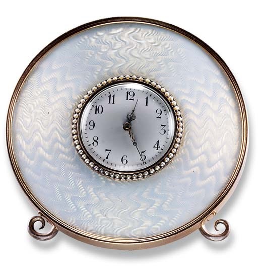 A BELLE EPOQUE ENAMEL AND PEARL TABLE CLOCK, BY FABERGE