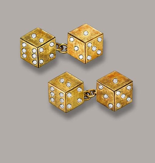A PAIR OF DIAMOND-SET CUFFLINKS, BY CARTIER