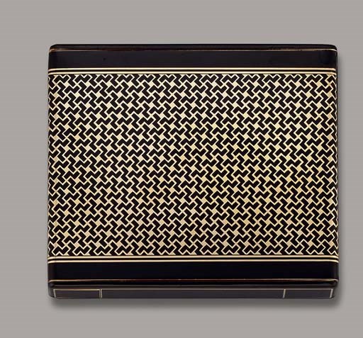 AN ART DECO ENAMEL POWDER COMPACT, BY CARTIER