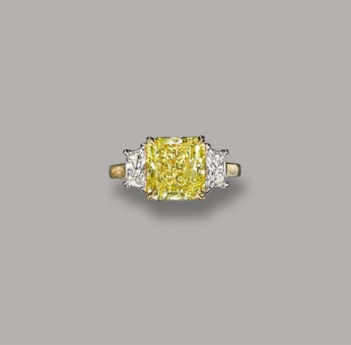 A COLOURED DIAMOND SINGLE-STONE RING, BY CARTIER