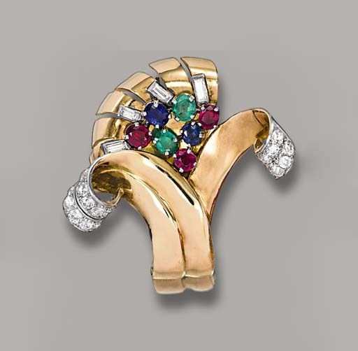 A DIAMOND AND GEM-SET CLIP BROOCH, BY CARTIER