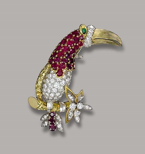 A DIAMOND AND GEM-SET TOUCAN CLIP BROOCH, BY CARTIER