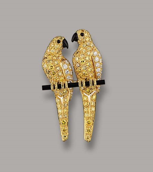 A COLOURED DIAMOND AND ONYX LOVEBIRD BROOCH, BY CARTIER