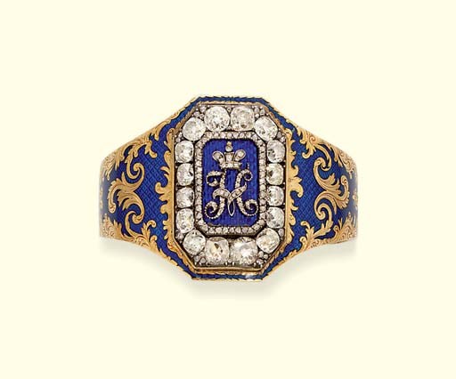 AN ANTIQUE DIAMOND AND ENAMEL BANGLE