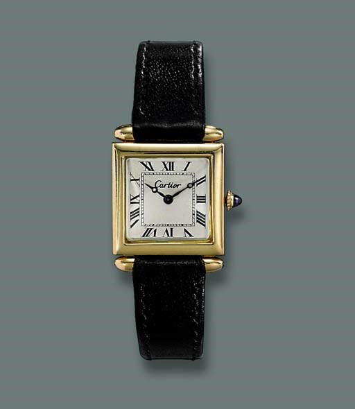 A GOLD TANK WRISTWATCH, BY CARTIER