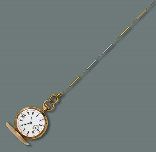 AN ANTIQUE GOLD POCKET WATCH