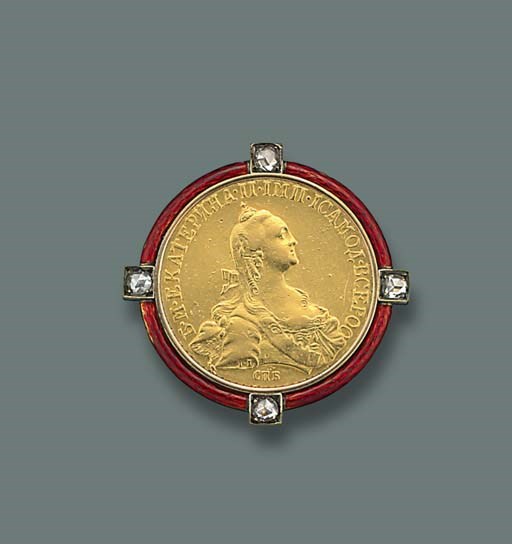 A DIAMOND AND ENAMEL COIN BROOCH