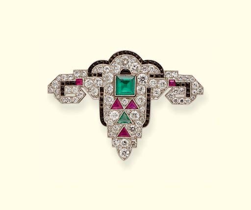 AN ART DECO DIAMOND AND GEM-SET BROOCH, BY JANESICH