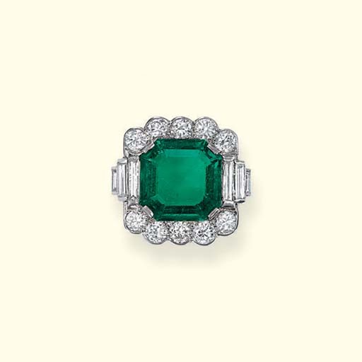 A FINE EMERALD AND DIAMOND RING
