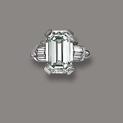 A RARE COLOURED DIAMOND SINGLE-STONE RING