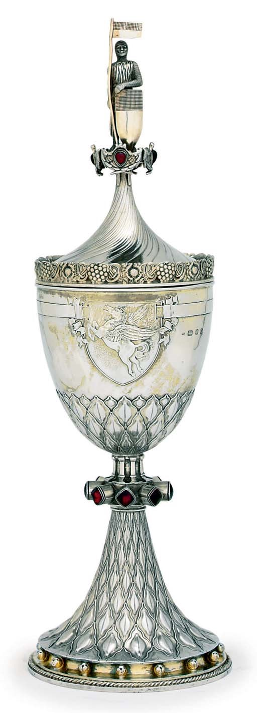 A SILVER CUP AND COVER