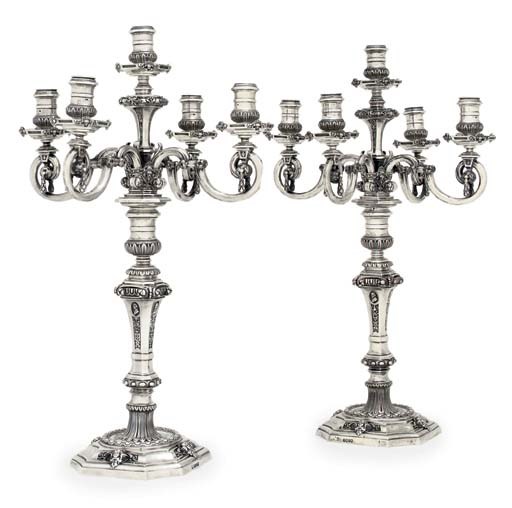 A PAIR OF VICTORIAN MASSIVE SILVER FIVE-LIGHT CANDELABRA
