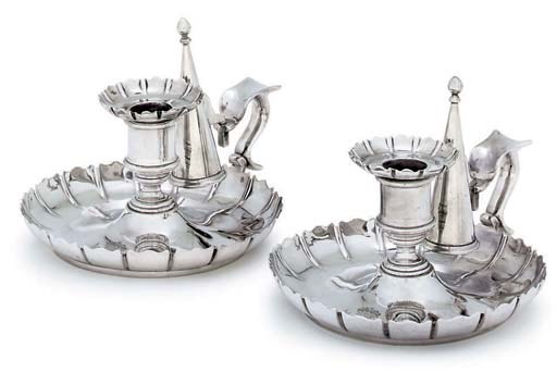 A PAIR OF VICTORIAN SILVER CHAMBER CANDLESTICKS