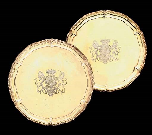 A PAIR OF GEORGE IV ROYAL SILVER-GILT SALVERS