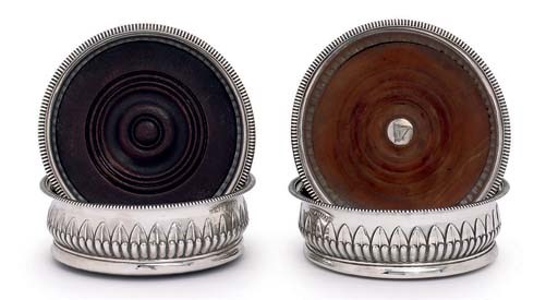 TWO PAIRS OF GEORGE III SILVER WINE COASTERS