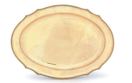 A GEORGE III SILVER-GILT MEAT-DISH