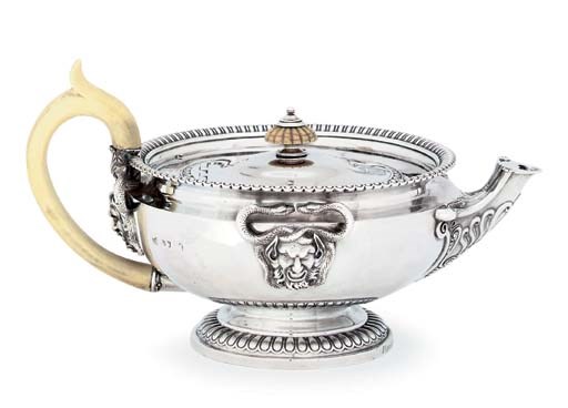 A GEORGE III SILVER TEAPOT