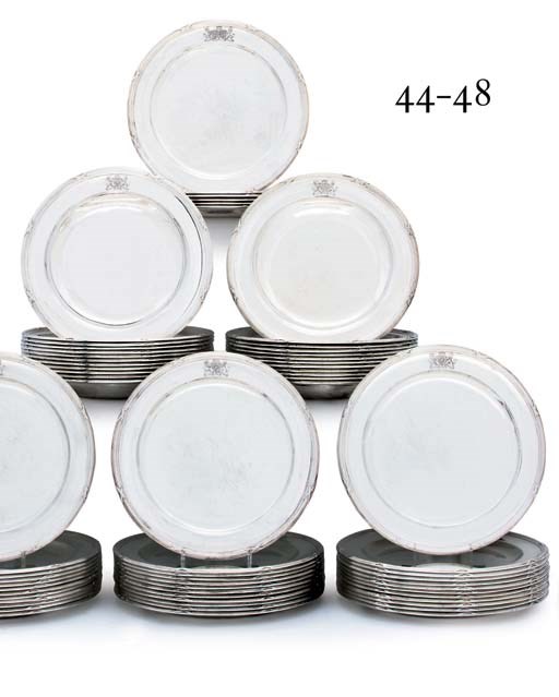 A SET OF TWELVE GEORGE III SILVER SOUP-PLATES