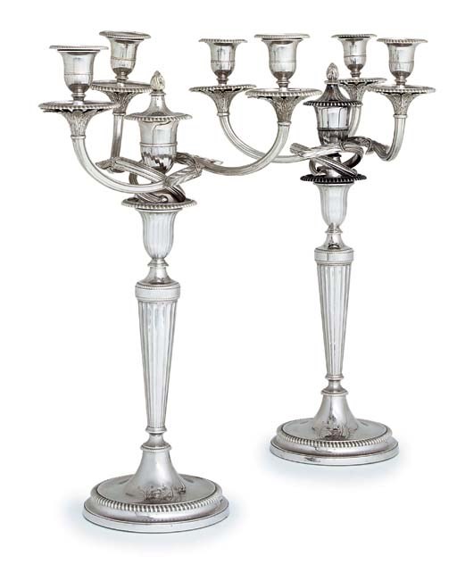A PAIR OF GEORGE III SILVER THREE-LIGHT CANDLEABRA